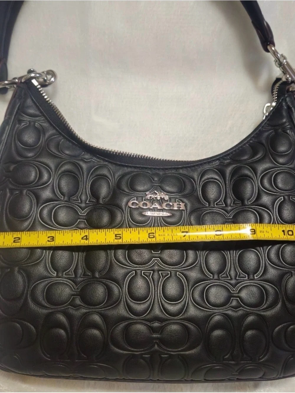 Coach black embossed